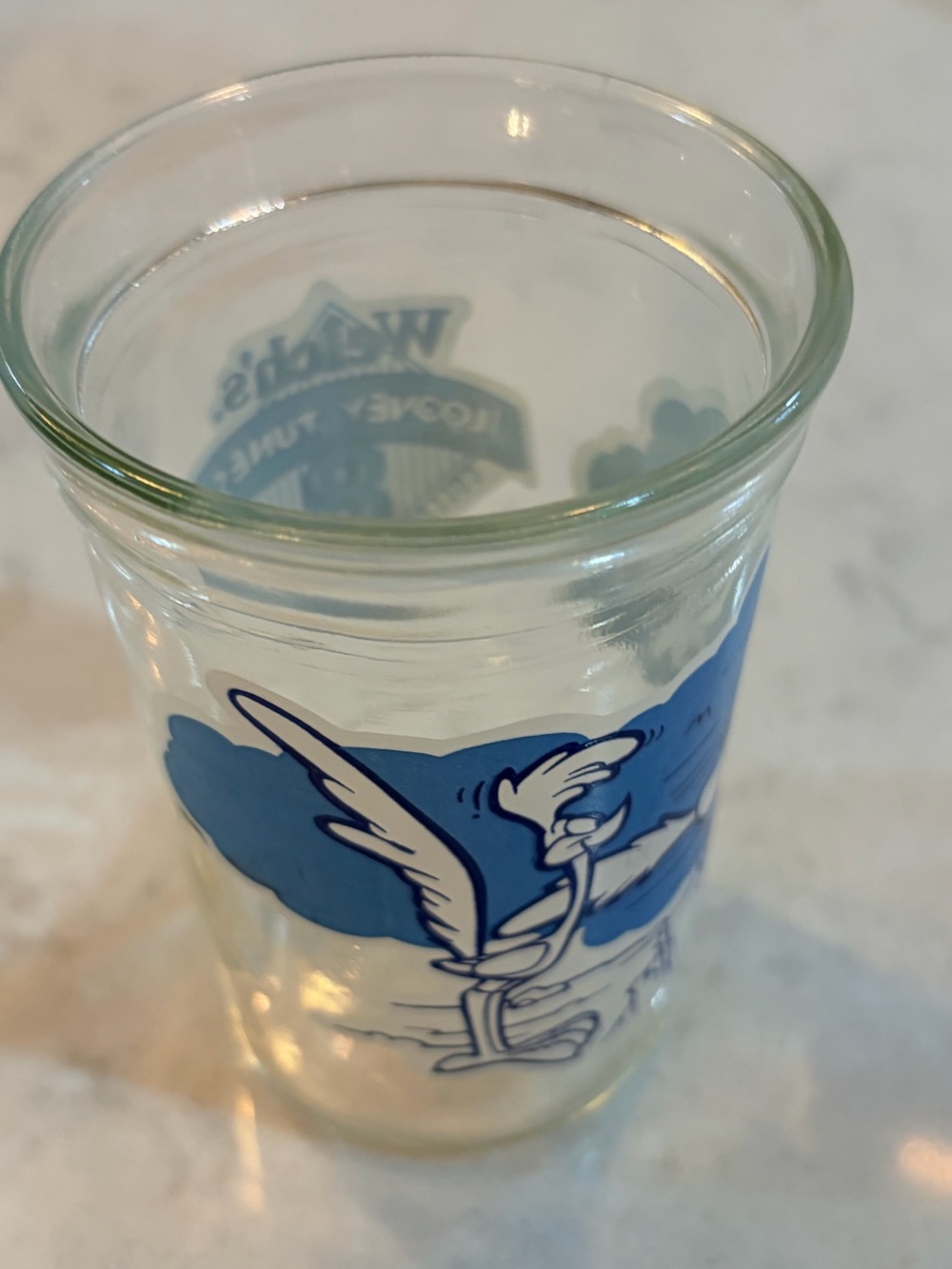 1994 Looney Tunes Welch’s series #8 of 12 Road Runner and Coyote Acme blue white
